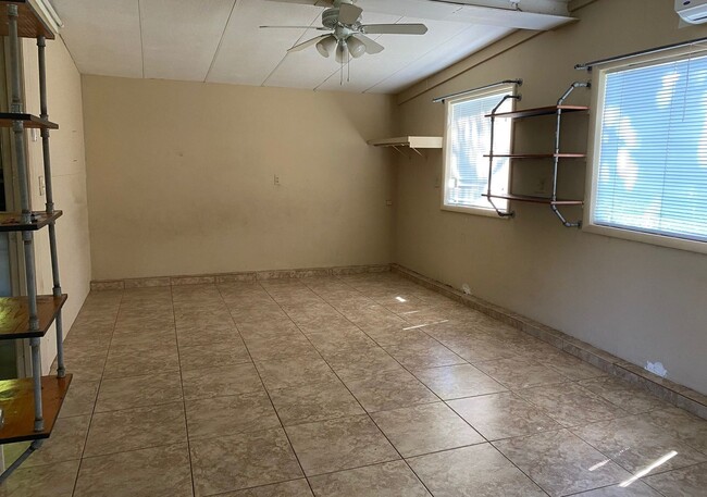 Building Photo - Affordable Efficiency Unit Available! Grea...
