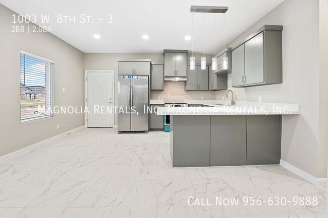 Building Photo - 1003 W 8th St