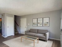 Building Photo - 4 Bed / 2 Full Bath House on a Quiet Dead-End Street — Attached Garage, Central A/C, W/D Hookups ...