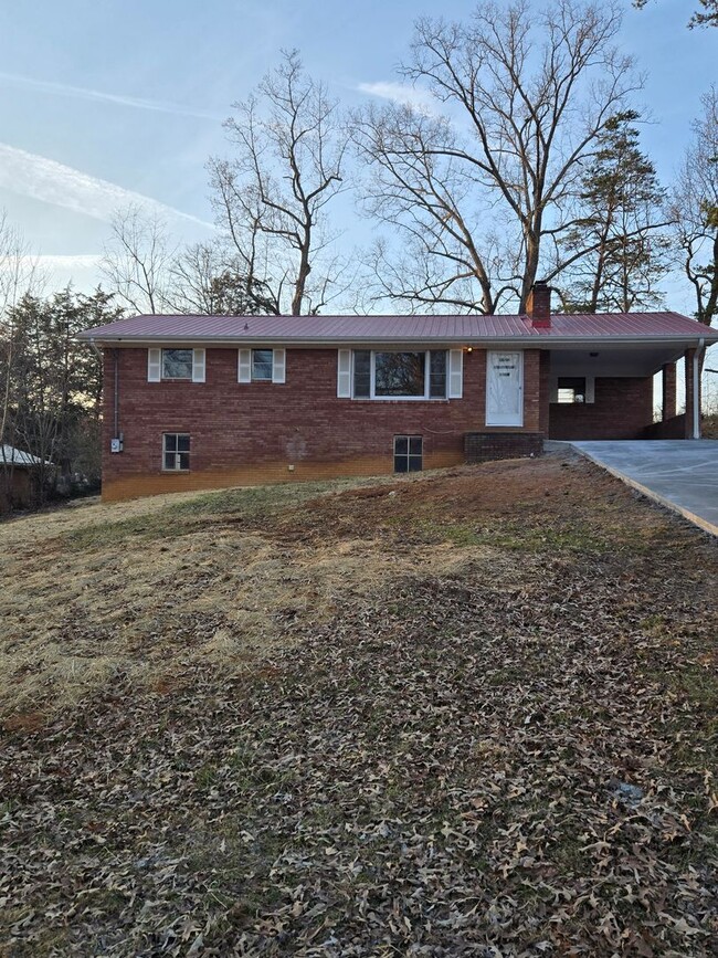 Primary Photo - Charming 3-Bedroom, 2-Bathroom Brick Home ...