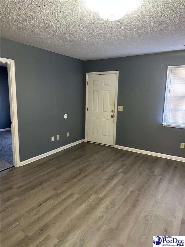 Building Photo - 1017 E National Cemetery Rd