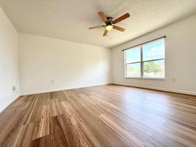 Building Photo - The perfect haven - 4Bedrooms / 2.5Bath family home at Orlando!