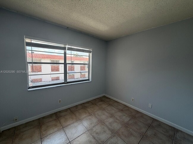 Building Photo - 3550 NW 8th Ave