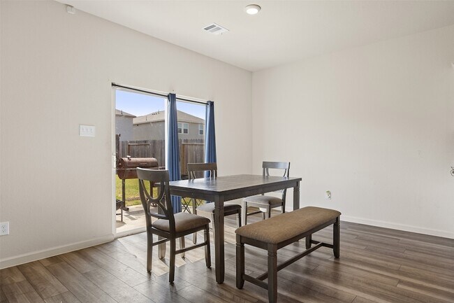 Building Photo - 7826 Pink Dahlia Dr