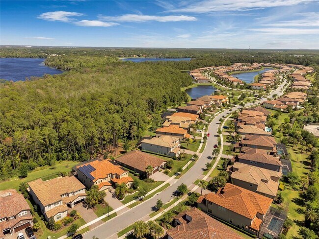 Building Photo - Gorgeous 3/2 Mediterranean Villa with Waterfront Screened Patio and 2-Car Garage in the Prestigio...