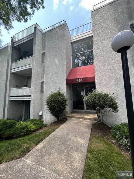 Parking lot entrance - 456 River Rd