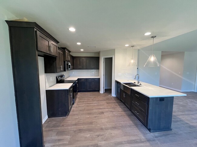 Building Photo - BRAND-NEW 3-bedroom, 2-bath home with Spri...