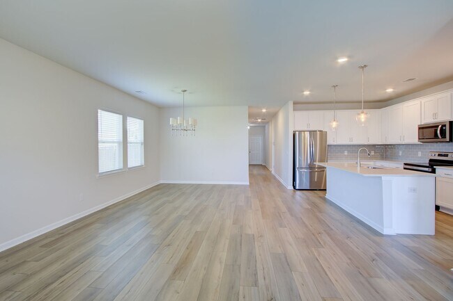 Building Photo - Spacious 4BR Rental with Stunning Kitchen & Covered Patio