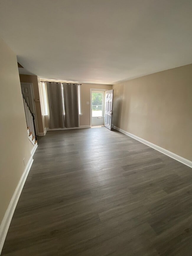 Building Photo - Completely New Row House with Deck Available Now