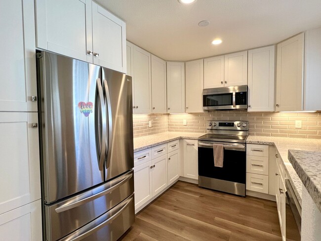 Primary Photo - Upgraded 2 Bedroom 2 Bath Condo with Lots ...