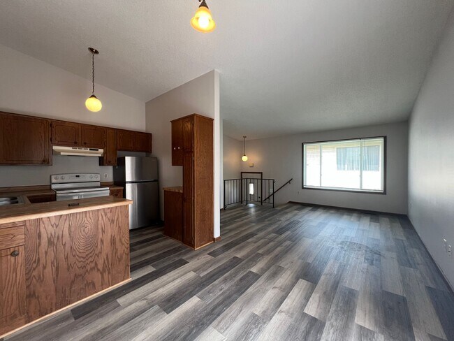 Building Photo - Spacious 2-Bed, 1-Bath Townhome with a Gar...