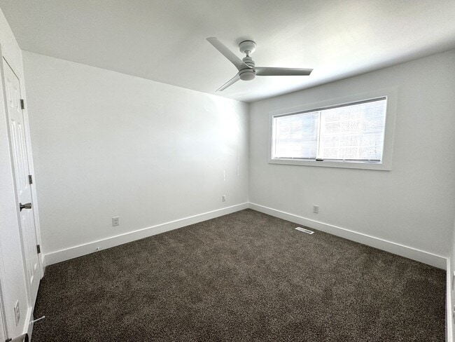 Building Photo - Completely Remodeled 2BR/1.5BA Townhome – City Convenience!