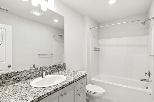 Building Photo - Spacious 5-Bedroom Home with Modern Upgrad...
