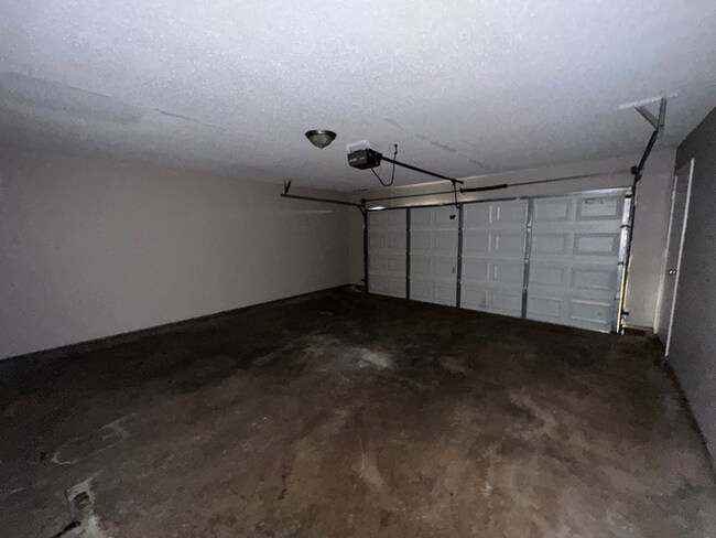 Building Photo - Grand 4BR/2BA Near Southwind | 2,438 Sq Ft, Stone Fireplace, Soaking Tub & 2-Car Garage