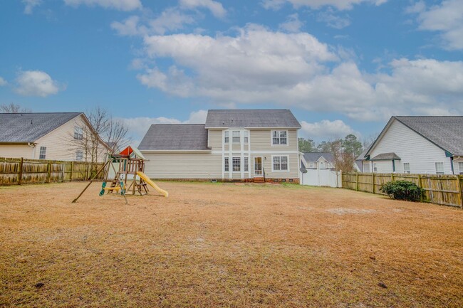Building Photo - "Charming 4-Bedroom Home with Granite Coun...