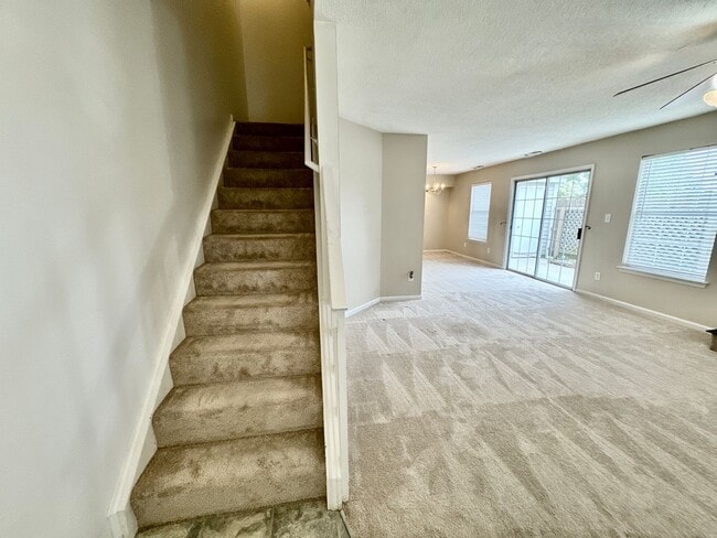 Building Photo - Available 06-15-25! End-Unit Condo w/2 Pri...