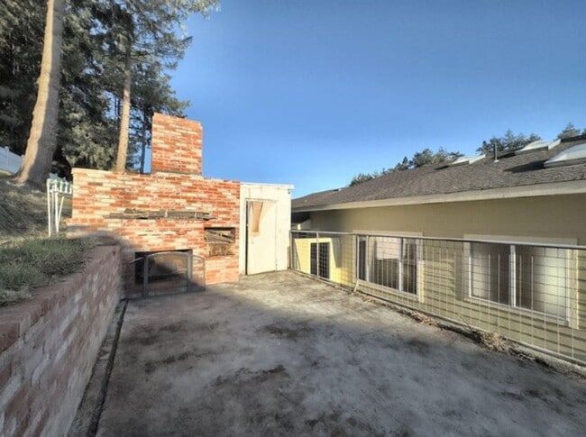 Building Photo - Spacious 4-Bedroom Home with Stunning Hill...