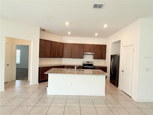 Building Photo - 13049 Thatch Palm Wy