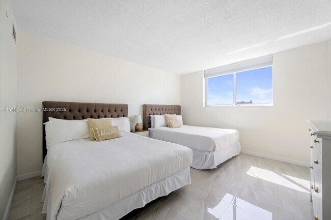 Building Photo - 19370 Collins Ave