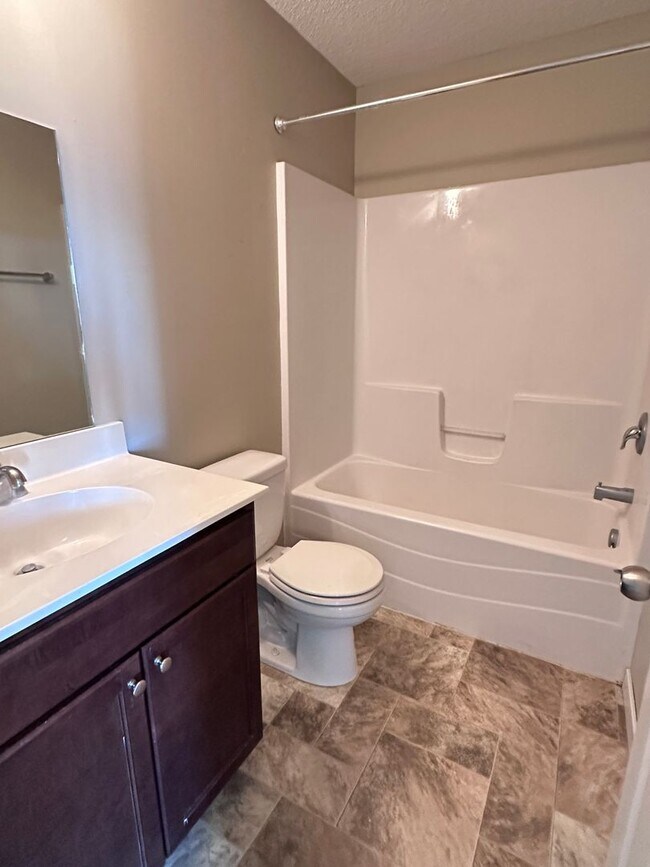 Building Photo - Champlin Corner Unit Town Home, 2 Car Garage, Dishwasher, Washer/Dryer, Balcony