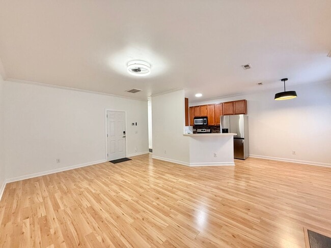 Building Photo - Modern 3BD, 2.5BA End Unit Raleigh Townhome with HOA Amenities Near I-540 & Triangle Town Center