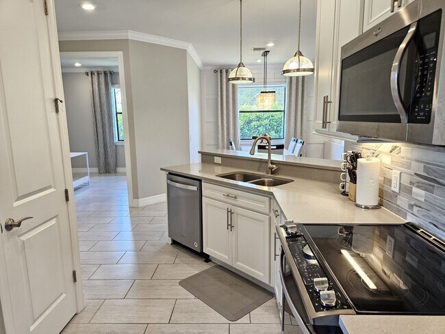 Building Photo - Stunning Model Home – 2 Bedrooms plus Den,...