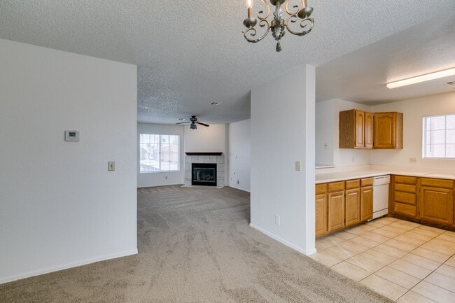 Building Photo - Charming Second-Floor Condo with Two Bedrooms and Fireplace