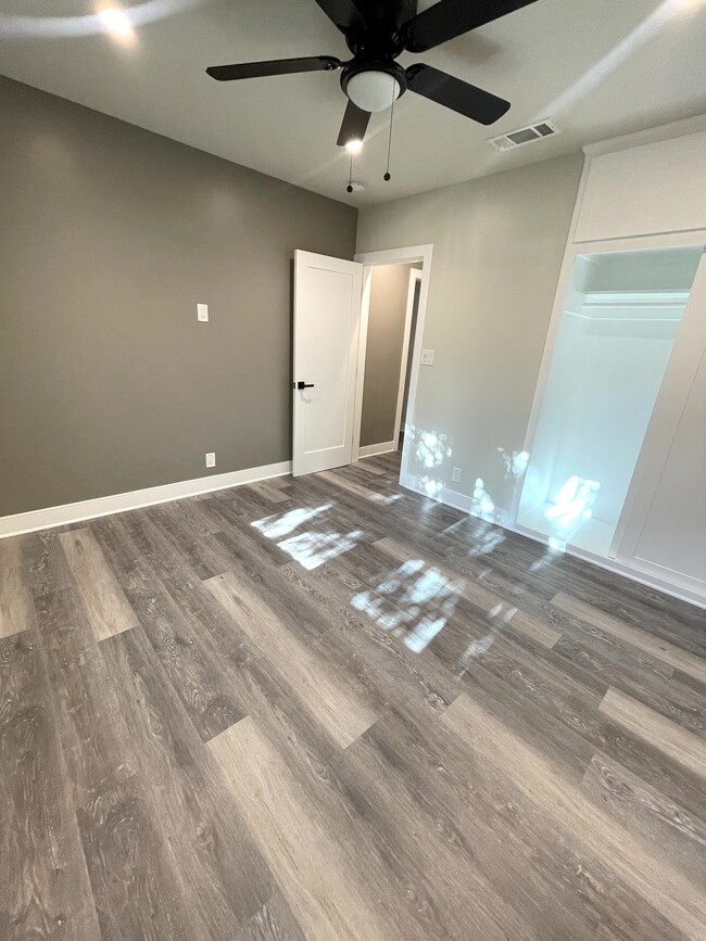 Bedroom with recessed dimmable lighting, ceiling fan, dual pane windows and ceiling fan - 3211 W Alameda Ave