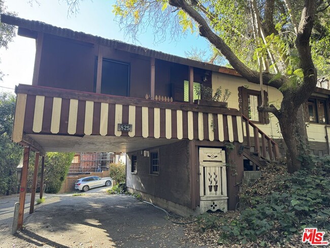 Building Photo - 825 N Beverly Glen Blvd