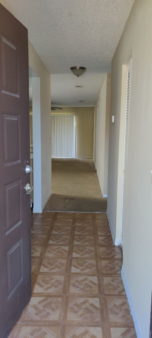 Building Photo - CORAL GARDENS 2 BEDROOM CONDO