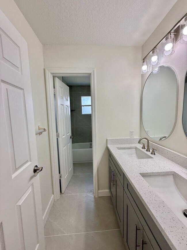 Building Photo - GORGEOUS, Large Completely Renovated Two-Story 4/2.5 PLUS LOFT in POINCIANA VILLAGES!