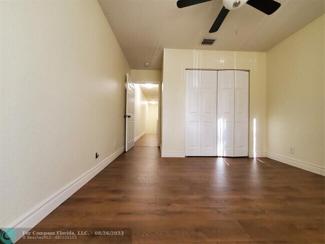 Building Photo - 7661 Tamarac Island Cir