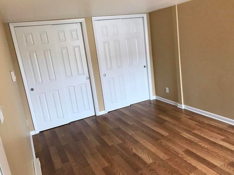 Larger bedroom - 25 W Main St