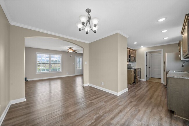 Building Photo - Spacious 4-Bedroom Home with Modern Upgrad...