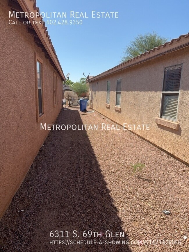 Building Photo - 6311 S 69th Glen