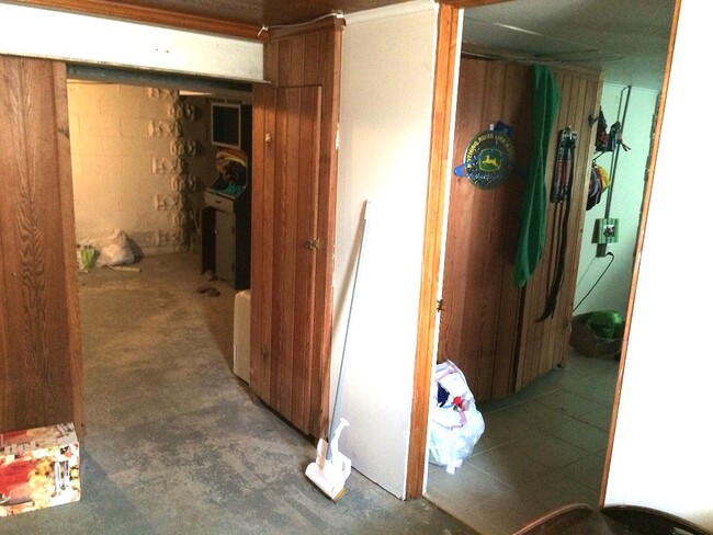 Basement bedroom (on the right) with half bath and large closets - 321 W 5th St