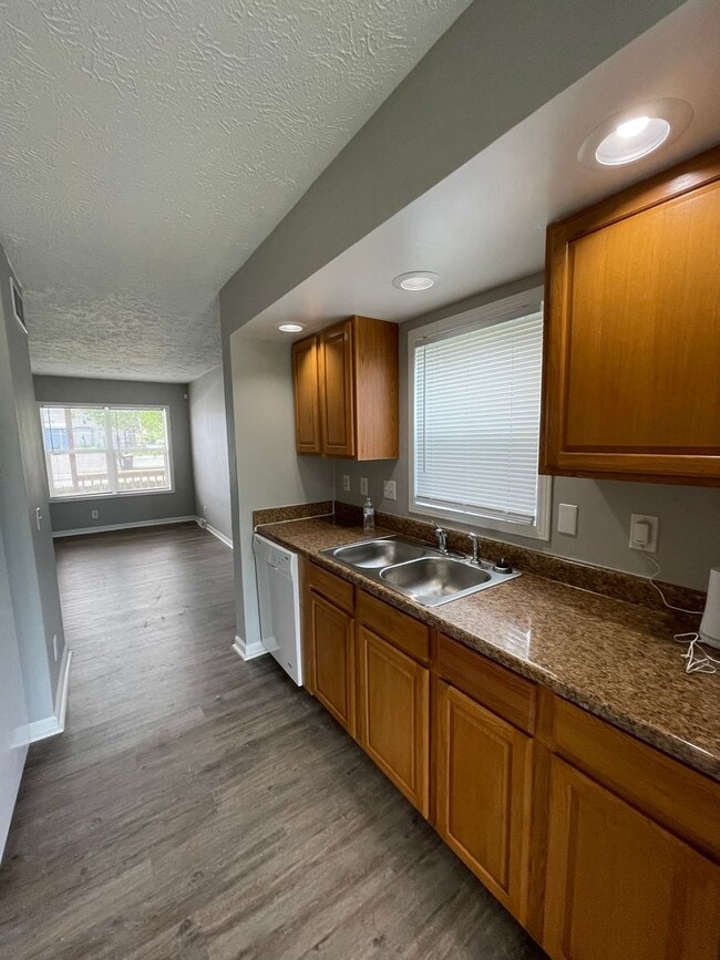 Building Photo - For Rent - Four-Bedroom Two-Bathroom Home ...