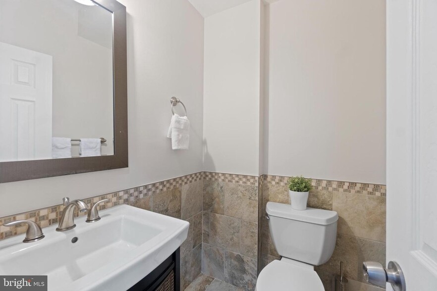 Downstairs half bath - 655 16th St NE