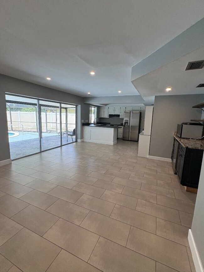 Building Photo - Stunning Custom Pool Home with Luxury Finishes!