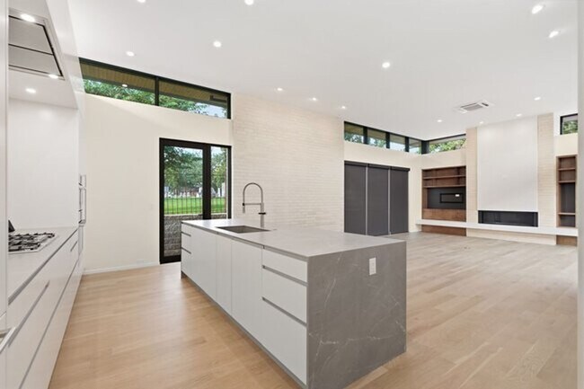 Building Photo - Experience contemporary luxury in this exceptional custom-built Midtown Tulsa residence, where so...