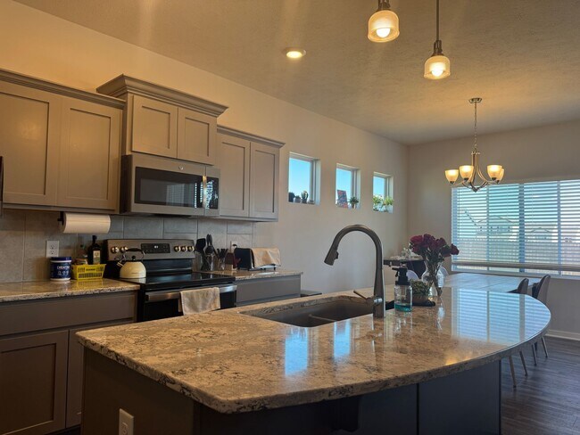 Building Photo - Spacious 4-Bedroom Ranch with Finished Basement & 3-Car Garage