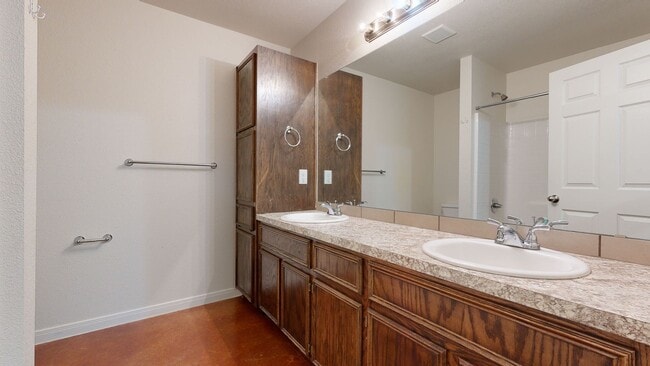 Building Photo - ALL STAINED CONCRETE FLOORING DUPLEX IN HA...