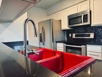 Building Photo - Beautifully Updated 2BR/2BA Condo in Gated Community – Modern Finishes & Pool Access