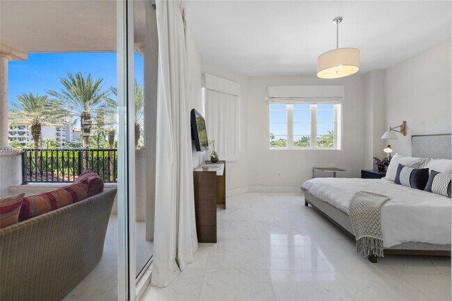 Building Photo - 7133 Fisher Island Dr