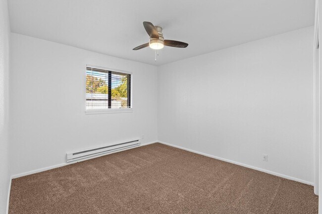 Building Photo - Fresh 2 Bed unit with giant yard, covered ...