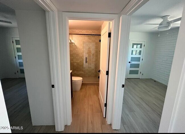 Building Photo - 5811 E Surrey Dr