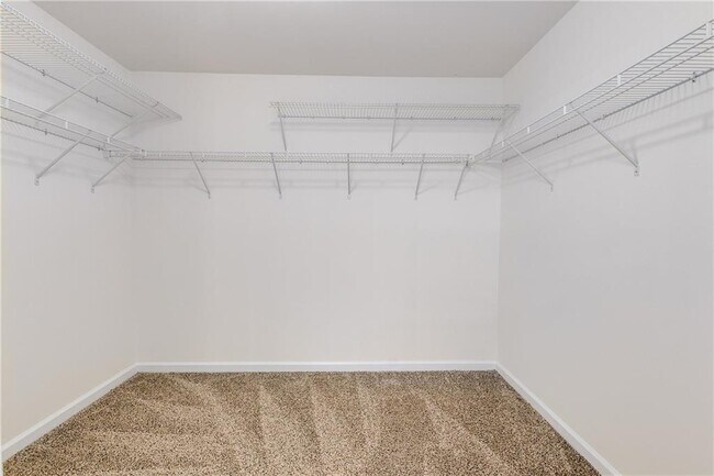 Building Photo - 4664 Creekside Villas Way