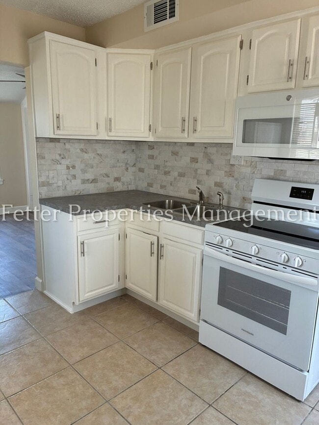 Building Photo - Summer Special! First Month's Rent Free!