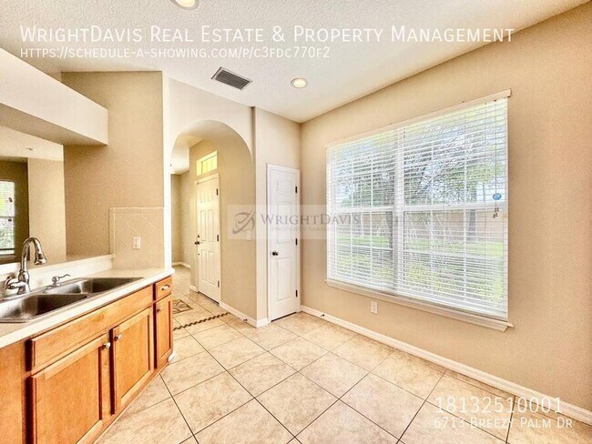 Building Photo - 6713 Breezy Palm Dr