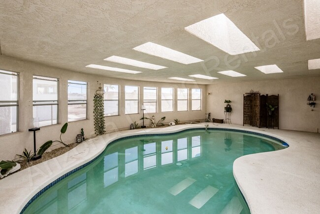 Building Photo - FURNISHED WITH INDOOR POOL